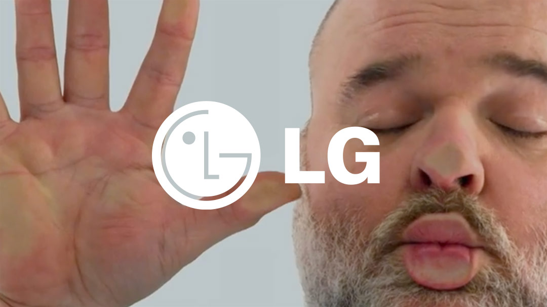 LG Logo with bearded man kissing glass window