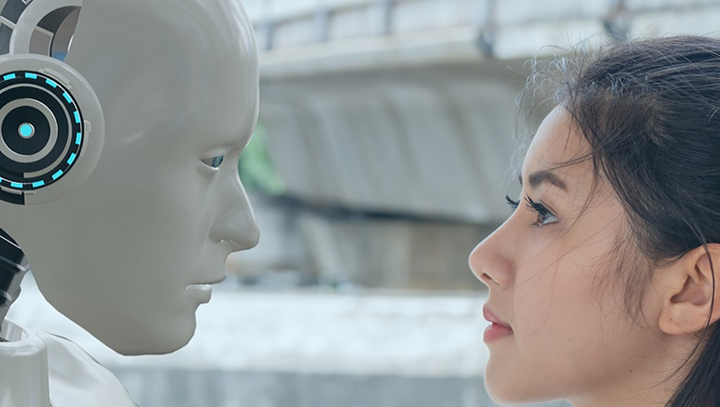 Robot and human looking face to face